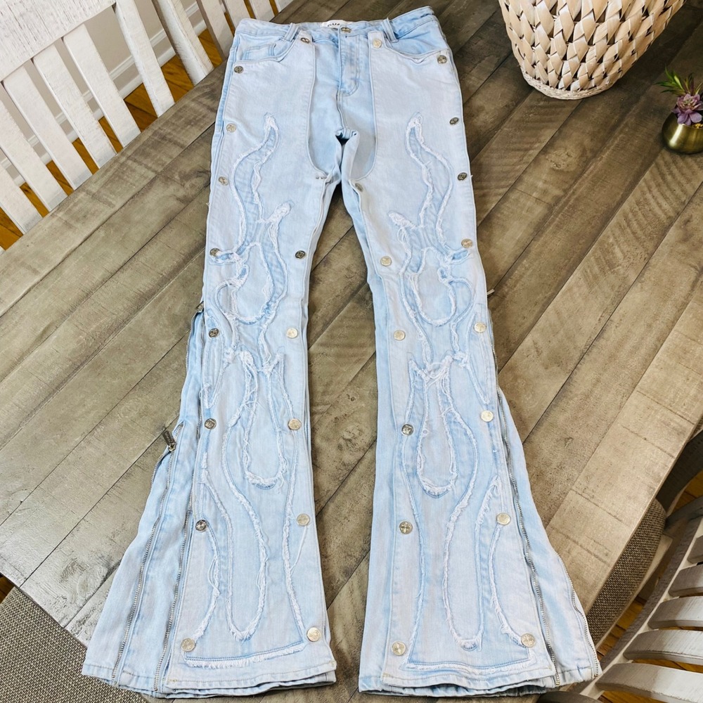 Light Blue Frayed Flare Jeans with Button Accent